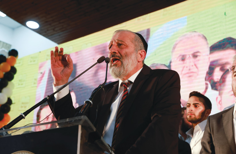  SHAS PARTY head Arye Deri speaks to supporters as projected results from the Knesset election are announced, in Jerusalem, on November 1. (photo credit: YOSSI ZAMIR/FLASH90)