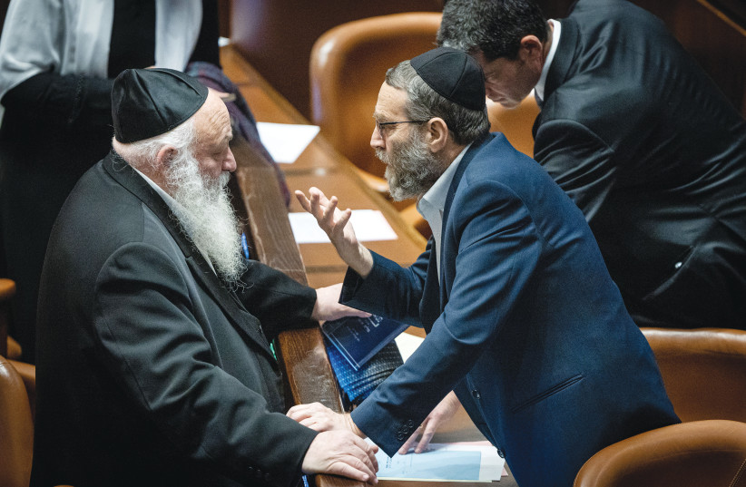  MK MOSHE Gafni (right) in deep discussion with fellow United Torah Judaism MK Yitzhak Goldknopf in the Knesset plenum last week. (photo credit: YONATAN SINDEL/FLASH90)