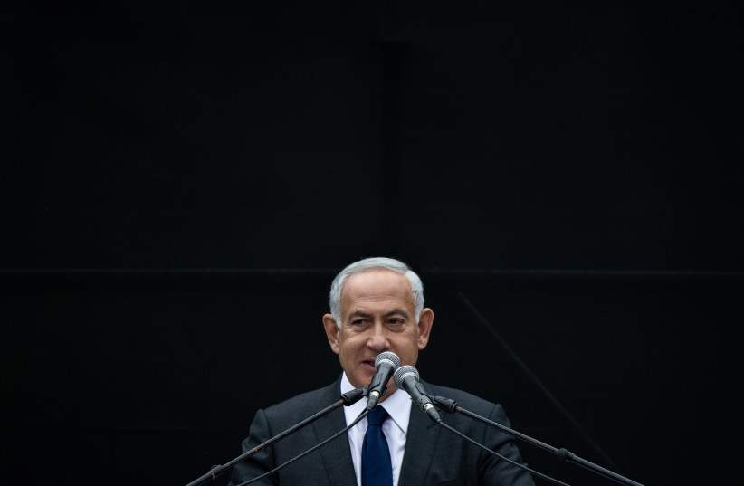  Prime minister-designate Benjamin Netanyahu speaks at the funeral of Rabbi Haim Drukman on December 26, 2022 in Masu'ot Itzhak. Rabbi Drukman passed away at the age of 90. (credit: YONATAN SINDEL/FLASH90)