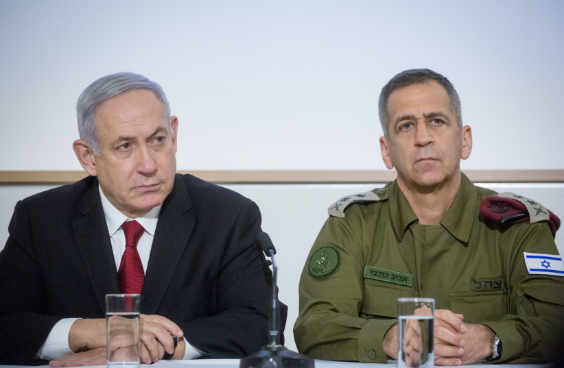  Prime Minister Benjamin Netanyahu and IDF Chief of Staff Lt.-Gen. Aviv Kohavi at a conference after a security cabinet meeting following the escalation of violence in with the Gaza Strip, at the Kirya headquarters in Tel Aviv, on November 12, 2019.  (photo credit: MIRIAM ALSTER/FLASH90)