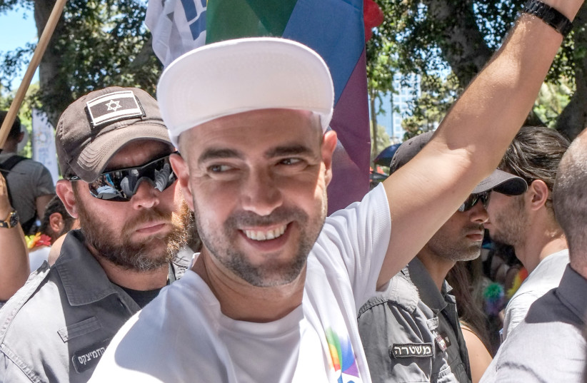 Then-Justice Minister Amir Ohana takes part in the 2015 Tel Aviv Pride Parade. (photo credit: MARC ISRAEL SELLEM)