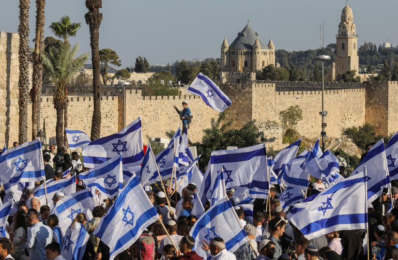  The ‘Ben-Gvir’ flag march in Jerusalem. This helped give the Otzma Yehudit leader many votes in the election. April 2022. (credit: MARC ISRAEL SELLEM/THE JERUSALEM POST)