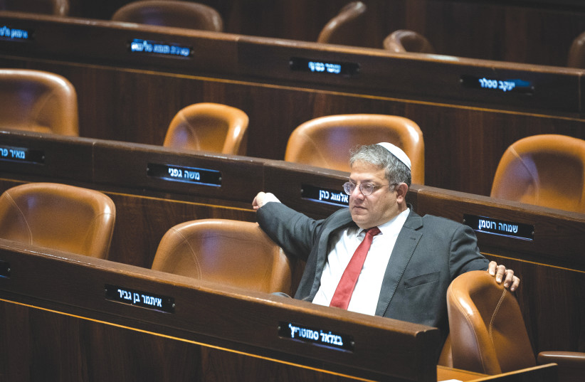  MK ITAMAR Ben-Gvir sits amid many empty chairs in the Knesset plenum, last week.  (photo credit: YONATAN SINDEL/FLASH90)