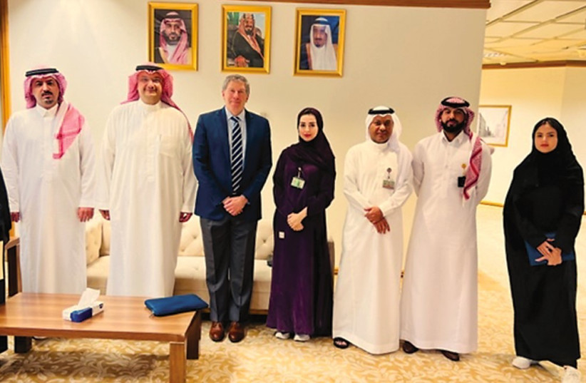  The writer with Saudi officials at the Presidency of State Security  (photo credit: Courtesy Eric Mandel)