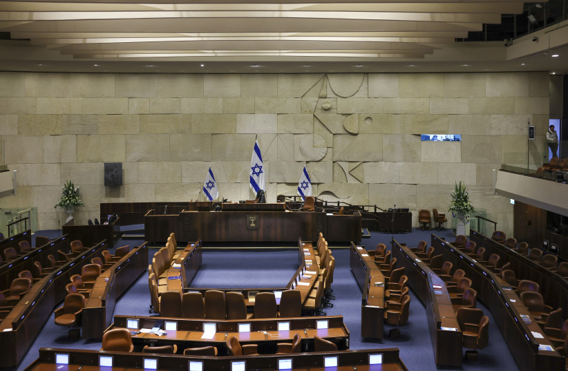  The Knesset Plenum is seen empty ahead of the swearing-in of Israel's 37th government, on December 29, 2022. (credit: NOAM MOSCOWITZ/KNESSET SPOKESMAN'S OFFICE)