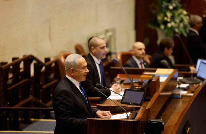  Incoming prime minister Benjamin Netanyahu speaks at the Knesset ahead of the special session on Thursday morning to ratify the country's 37th government. (photo credit: MARC ISRAEL SELLEM)