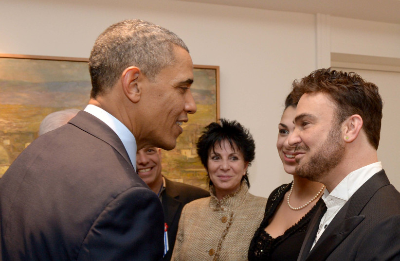  SPEAKING WITH US president Barack Obama after his performance at the President’s Residence in Jerusalem, 2013. (photo credit: ELAD GUTMAN)