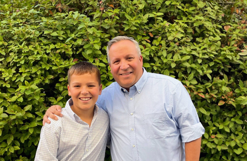  THE AUTHOR and his son. (photo credit: Wexler family)