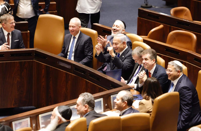  PM Netanyahu with several of his ministers at the swearing-in ceremony of the new government in the Knesset, December 29 2022. (photo credit: MARC ISRAEL SELLEM)