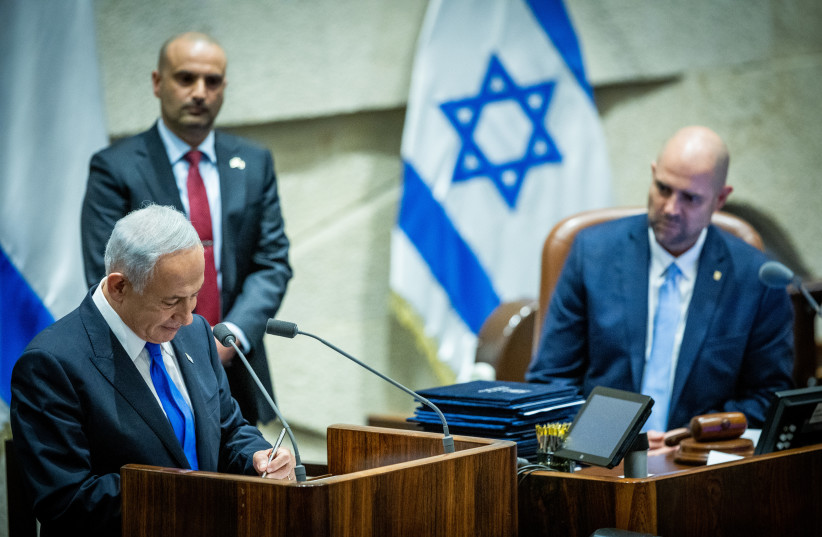  Prime Minister Benjamin Netanyahu next to Knesset Speaker Amir Ohana in the Knesset Plenum, December 29, 2022. (photo credit: YONATAN SINDEL/FLASH90)