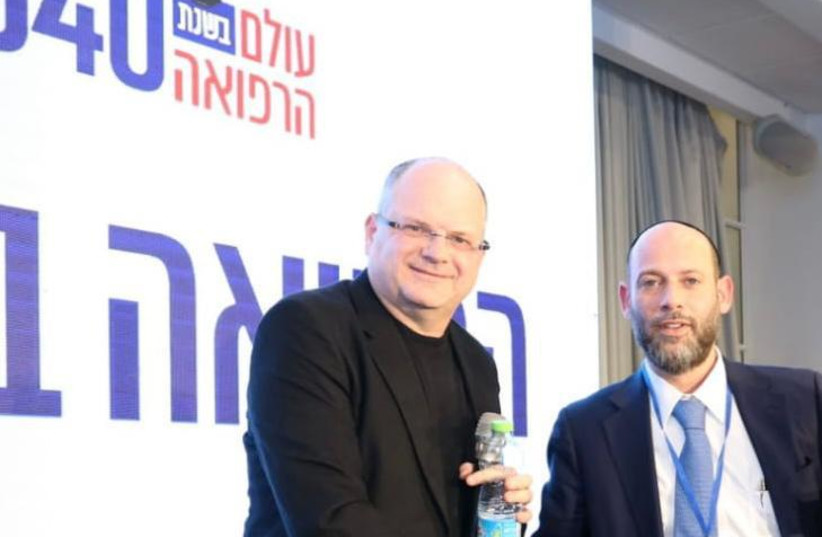  Chairman of L’maanchem, Rabbi Yossi Erblich, with Check Point founder Gil Schwed. (credit: Yehuda Urishalimi)