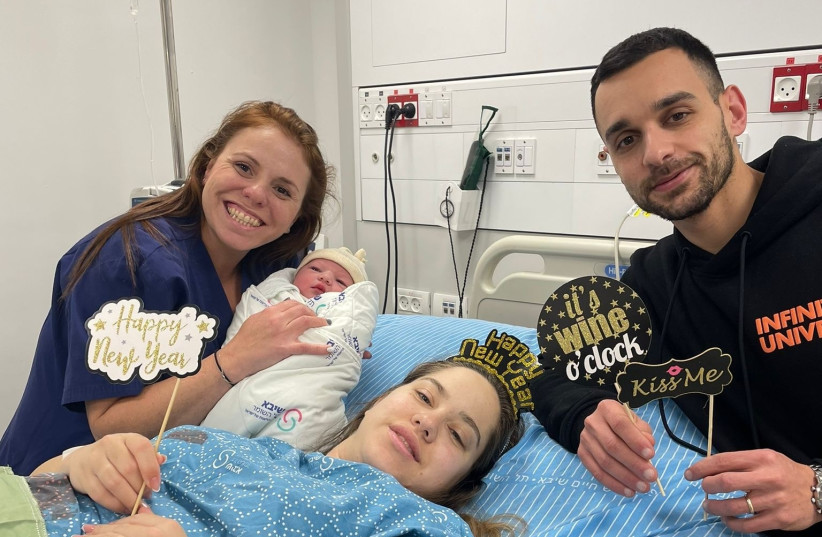  Biti Yaakovi and Gal Yifrah from Ashdod with their baby daughter at Sheba Medical Center, January 1, 2023. (credit: SHEBA MEDICAL CENTER)