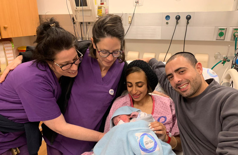  Tal and Nahum Ben-Zaken welcome their baby boy at Hillel Yaffe Medical Center, January 1, 2023 (credit: HILLEL YAFFE MEDICAL CENTER)