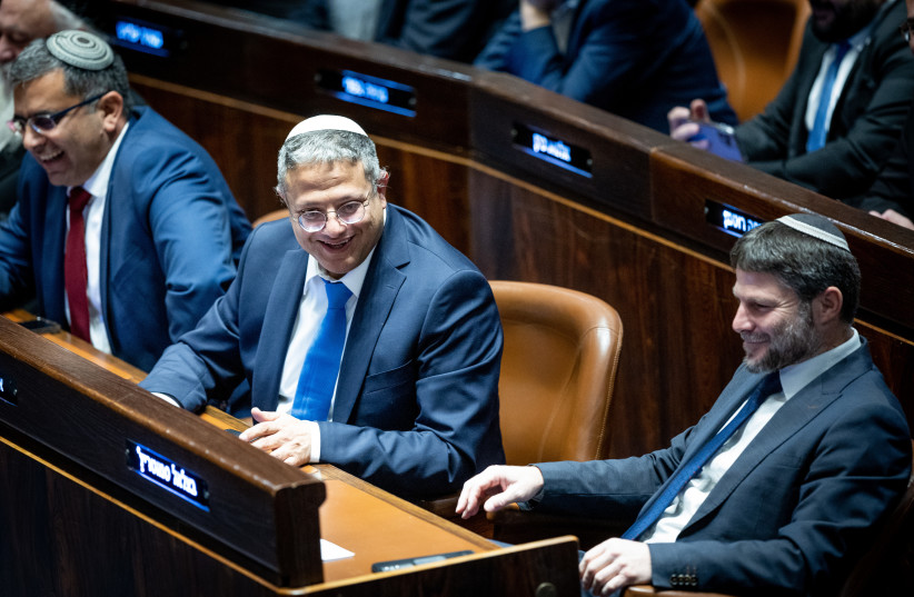 Itamar Ben-Gvir, national security minister and Finance Minister Bezalel Smotrich at the swearing in ceremony of the new israeli government at the Knesset, the Israeli parliament in Jerusalem, on December 29, 2022. (credit: YONATAN SINDEL/FLASH90)