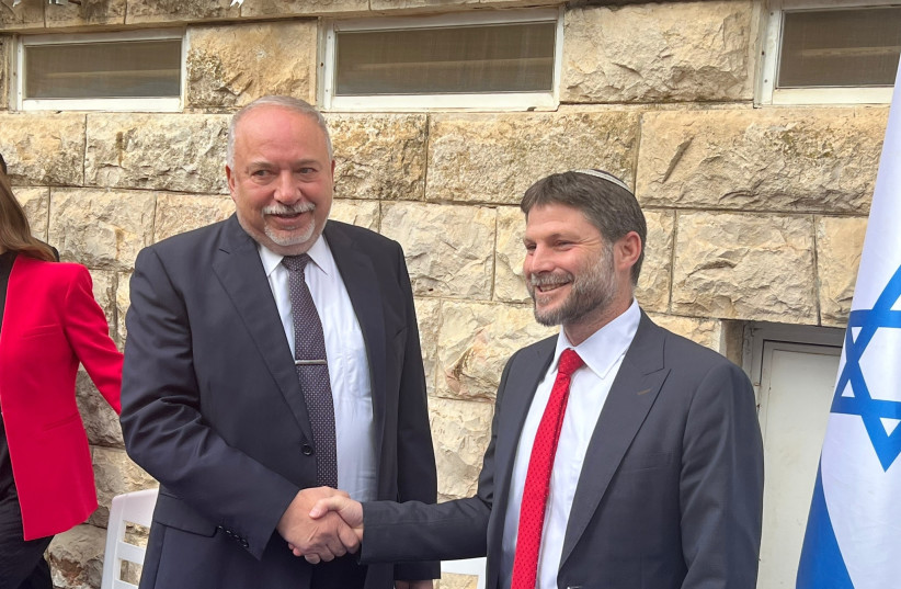  ministerial exchange ceremony at the Finance Ministry between the incoming minister Bezalel Smotrich and former minister Avigdor Liberman (photo credit: RAFI BEN HAKOON/GPO)