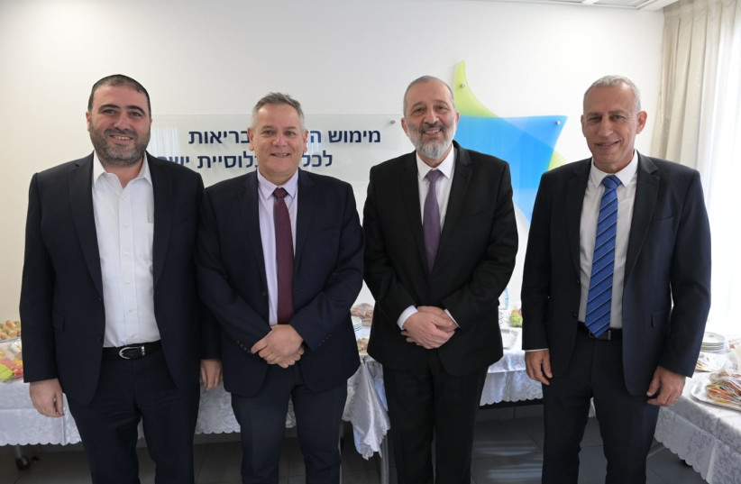  Aryeh Deri, second from right, Nitzan Horowitz second from left, Prof. Nachman Ash at right, MK Moshe Arbel at left. (credit: GOVERNMENT PRESS OFFICE)