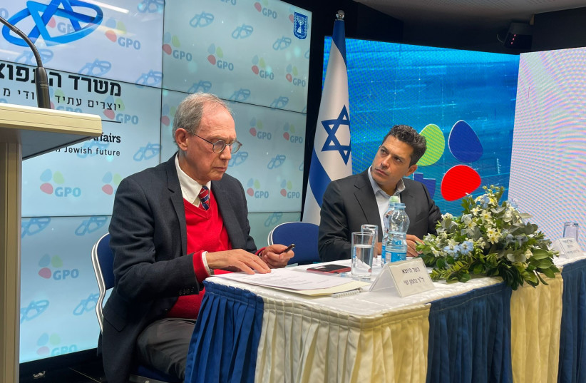  Israeli Diaspora Affairs Minister Amichai Chikli (R) is seen at the handover ceremony alongside outgoing minister Nachman Shai, in Jerusalem, on January 2, 2023. (photo credit: DIASPORA AFFAIRS MINISTRY)