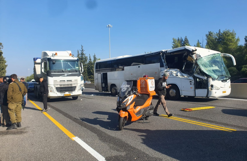  The scene of the bus crash on Highway 1 in which a 10-year-old girl was seriously injured, January 3, 2023. (credit: UNITED HATZALAH‏)