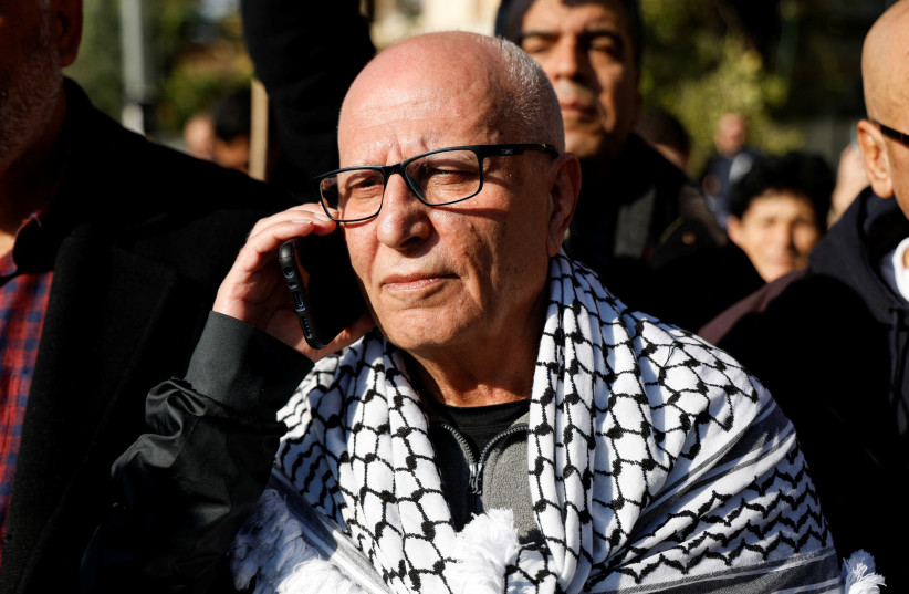  Longest serving Palestinian prisoner, Karim Younis, speaks on the phone as he is welcomed at his village, after he was freed from Israeli jail earlier today, in Ara, Israel January 5, 2023. (photo credit: REUTERS/AMMAR AWAD)