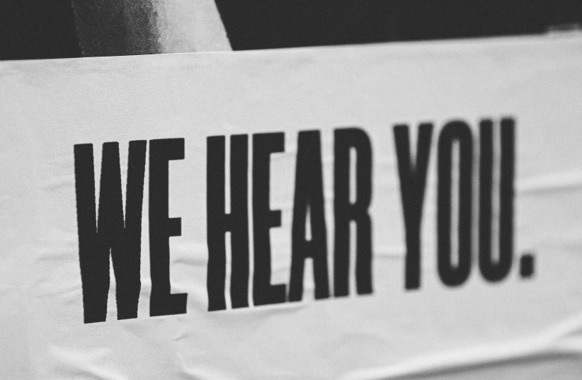  Sadly, we are often preoccupied with formulating our brilliant responses rather than actively listening to others. (photo credit: JON TYSON/UNSPLASH)