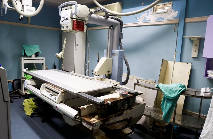  A view of a broken X-ray machine at Shifa hospital in Gaza City, January 5, 2023.  (photo credit: IBRAHEEM ABU MUSTAFA/REUTERS)