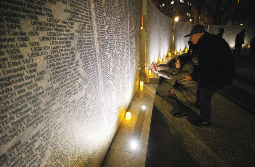 THE SHOAH Wall of Names Memorial in Vienna in 2021, bearing the names of more than 64,000 Austrian Jews killed in the Holocaust. (photo credit: Lisi Niesner/Reuters)