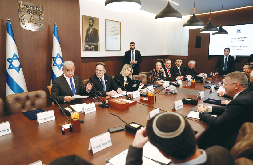  PRIME MINISTER Benjamin Netanyahu convenes a cabinet meeting this past week in Jerusalem. Strike while the iron is hot, the writer advises. (photo credit: ATEF SAFADI/REUTERS)