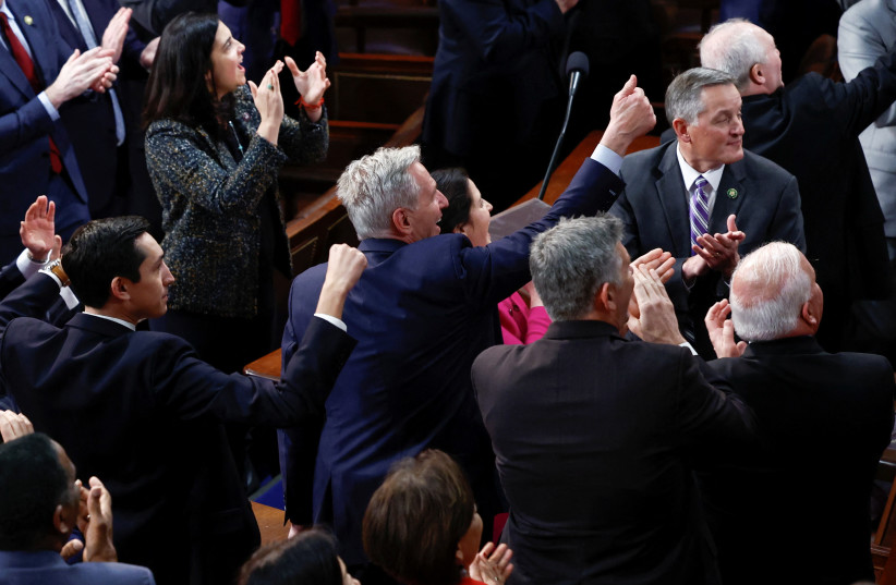  U.S. House Republican Leader Kevin McCarthy (R-CA) celebrates as he is elected to be the next Speaker of the U.S. House of Representatives in a late night 15th round of voting on the fourth session of the 118th Congress at the U.S. Capitol in Washington, U.S., January 7, 2023. (photo credit: REUTERS/EVELYN HOCKSTEIN)