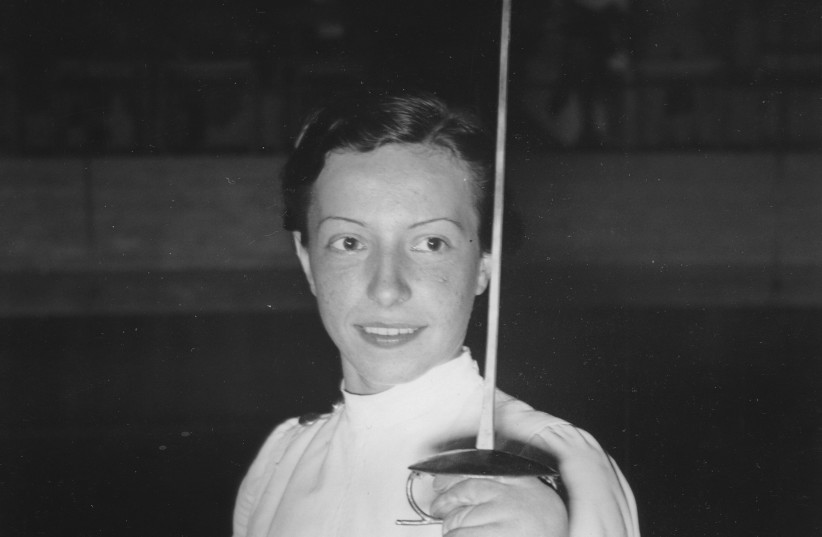  The Hungarian fencer Ilona Elek-Schacherer wins in foil fencing during the Olympic Games, Aug. 1936.  (credit: Austrian Archives/Imagno/Getty Images)