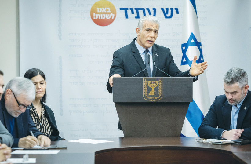  MK YAIR Lapid speaks during a faction meeting of his Yesh Atid party in the Knesset, last Monday. Lapid is instinctively and reflexively pandering to the Biden administration, says the writer. (photo credit: YONATAN SINDEL/FLASH90)