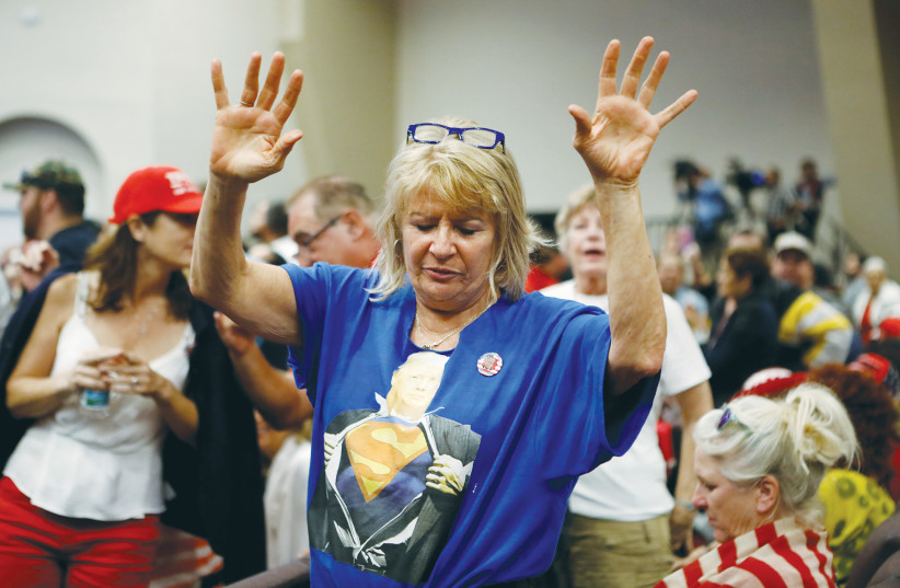  AN EVANGELICAL supporter prays at an event with then-US president Donald Trump in Miami, in 2020. Evangelical Christians have supported Israel as a means to accelerate Armageddon, says the writer. (photo credit: EVA MARIE UZCATEGUI/ REUTERS)