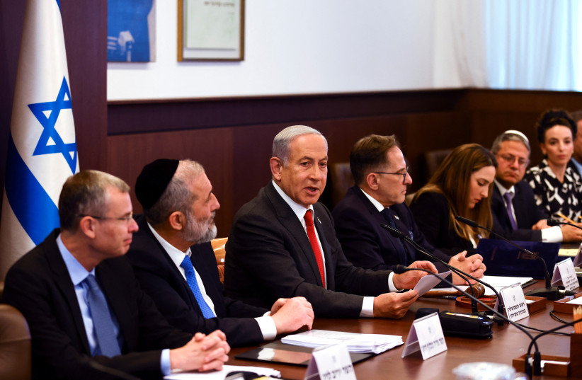  Israeli Prime Minister Benjamin Netanyahu convenes a weekly cabinet meeting at the Prime Minister's office in Jerusalem, January 8, 2023 (credit: REUTERS/Ronen Zvulun/Pool)