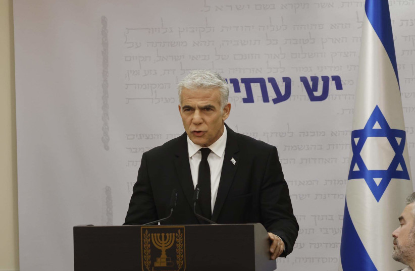  Opposition Leader Yair Lapid speaking ahead of his Yesh Atid party's faction meeting. (credit: MARC ISRAEL SELLEM)