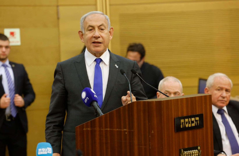  Prime Minister Benjamin Netanyahu at the beginning of his party's faction meeting. (credit: MARC ISRAEL SELLEM)
