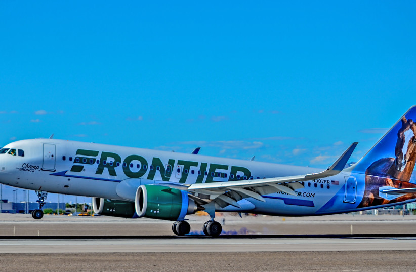  A Frontier Airlines plane. This one has a horse on its tail. (credit: Wikimedia Commons)