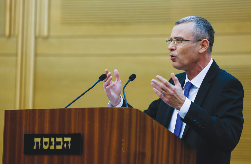  JUSTICE MINISTER Yariv Levin holds a news conference at the Knesset, last week.  (photo credit: OLIVIER FITOUSSI/FLASH90)