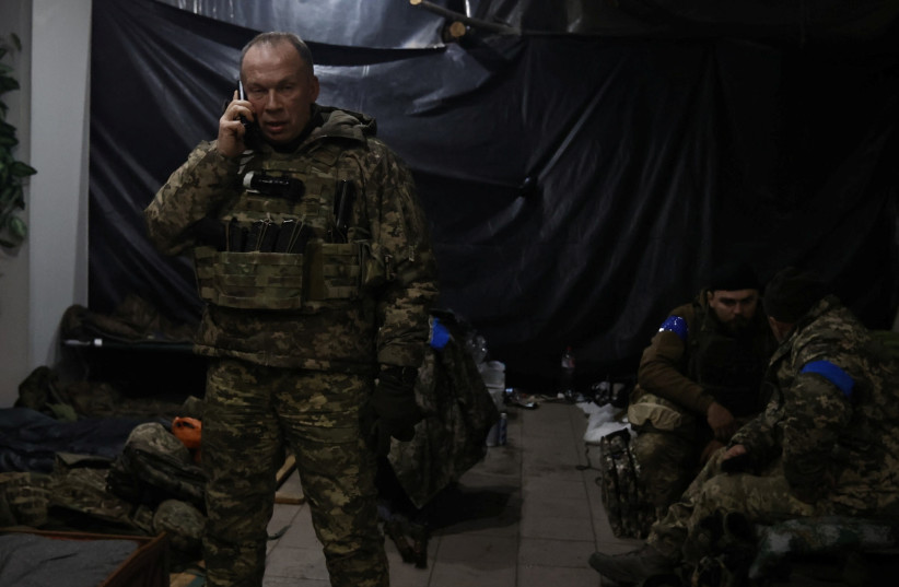  Colonel general Oleksandr Syrskyi, Commander of the Ground Forces of Ukraine visits a position of his troops in a frontline, amid Russia's attack on Ukraine, in the town of Soledar, Donetsk region, Ukraine, in this handout picture released January 9, 2023. (credit: Ukrainian Ground Forces/Handout via REUTERS)