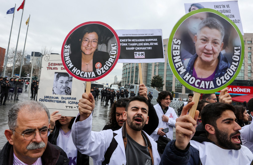 Supporters of the Turkish Medical Association (TTB) head Sebnem Korur Fincanc demonstrate in front of the Justice Palace, the Caglayan Courthouse, in Istanbul, Turkey January 11, 2023 (credit: REUTERS/UMIT BEKTAS)