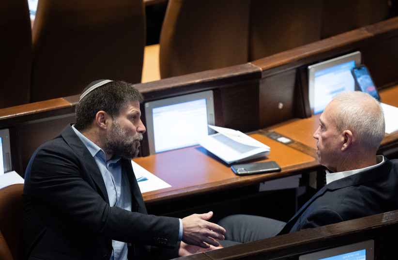  MK's Bezalel Smotrich and Yoav Galant at a plenum session at the assembly hall of the Knesset, the Israeli parliament in Jerusalem, on December 14, 2022. (photo credit: YONATAN SINDEL/FLASH90)