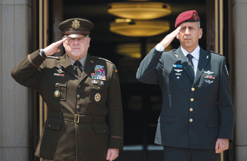  WITH US Chairman of the Joint Chiefs of Staff Gen. Mark Milley at an enhanced honor cordon at the Pentagon in Washington, 2021.  (credit: JIM WATSON/AFP VIA GETTY IMAGES)