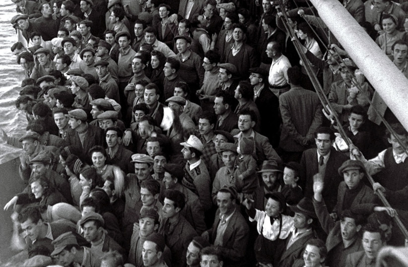  JEWISH IMMIGRANTs from war-torn Europe pack the ship ‘SS Atzmaut’ on its way to Haifa, between the 1947 UN partition vote and the 1948 declaration of the State of Israel. (credit: REUTERS)