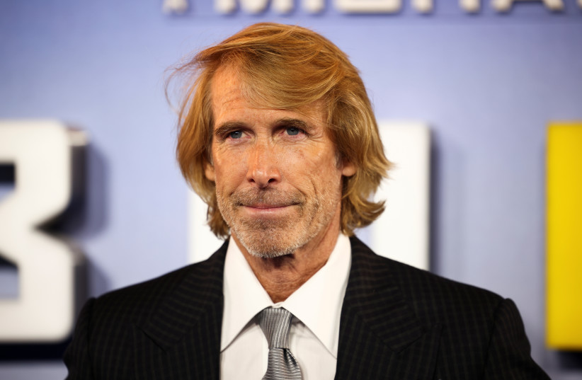 Director Michael Bay poses as he arrives at a special screening for the film 'Ambulance' in London, Britain March 23, 2022. (photo credit: REUTERS/HENRY NICHOLLS)
