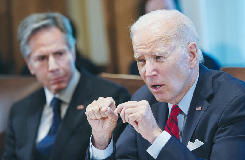  US PRESIDENT Joe Biden speaks during a cabinet meeting at the White House, as Secretary of State Antony Blinken looks on, earlier this month. (credit: KEVIN LAMARQUE/REUTERS)