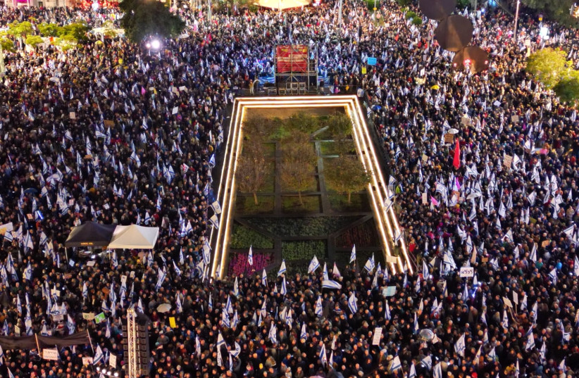  Israeli protestors gather at Habima Square in Tel Aviv for mass demonstrations against the government on January 14, 2022 (credit: Amir Goldstein)