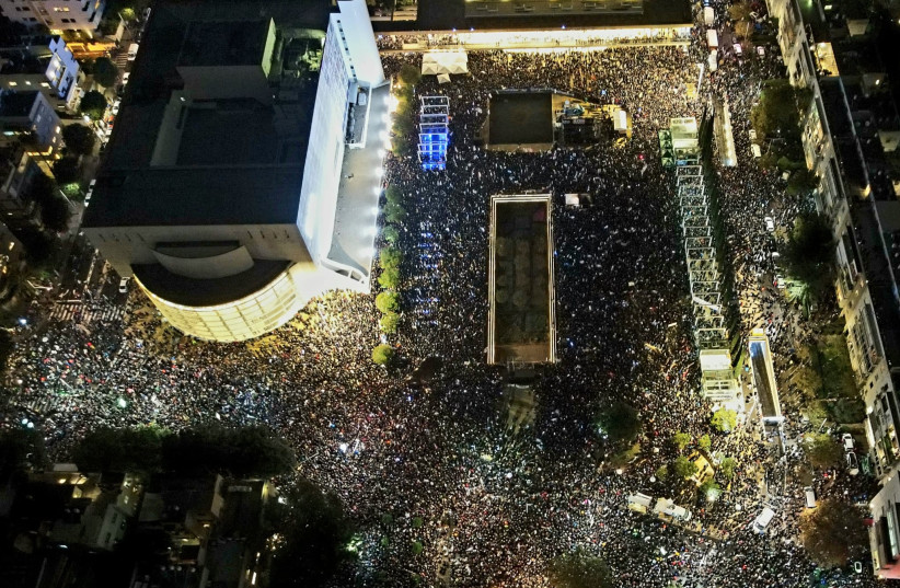 Tens of thousands of Israelis protest the government's judicial reform in Tel Aviv's Habima Square seen in this drone footage taken January 14, 2023 (photo credit: Amir Goldstein)