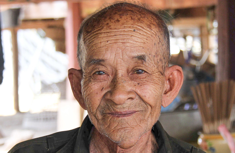 Old man with wrinkles in Don Det in Laos. (credit: Basile Morin/Wikimedia Commons)
