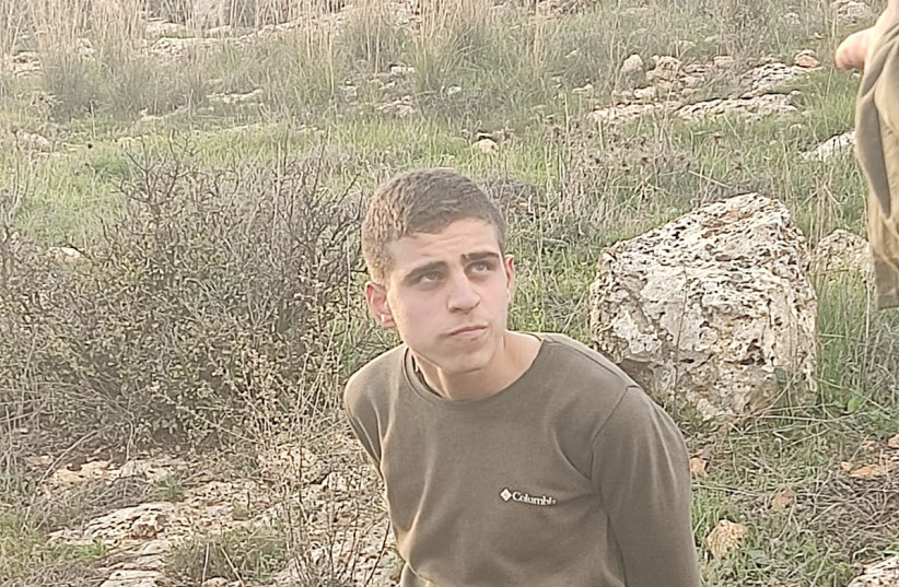  A terrorist arrested after attempting to infiltrate the Israeli settlement of Elon Moreh in the West Bank while armed with knives, on January 17, 2023. (credit: SAMARIA REGIONAL COUNCIL)