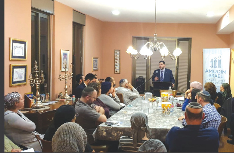  THE WRITER speaks about child sexual abuse prevention, at an Amudim gathering in Hashmonaim. (photo credit: AMUDIM ISRAEL)