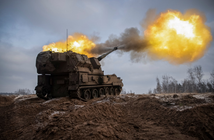  Ukrainian servicemen fire a Polish self-propelled howitzer Krab toward Russian positions, amid Russia's attack on Ukraine, on a frontline in Donetsk region, Ukraine January 17, 2023.  (credit: REUTERS/OLEKSANDR RATUSHNIAK)