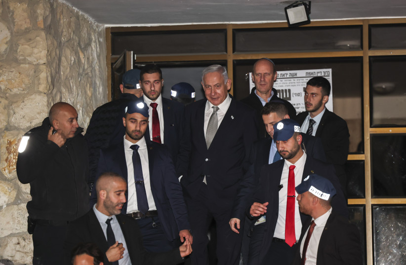  Prime Minister and head of the Likud party Benjamin Netanyahu seen after a meeting with Shas head Aryeh Deri outside his home in Jerusalem on January 18, 2023 (photo credit: YONATAN SINDEL/FLASH90)